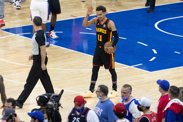 Atlanta Hawks guard Trae Young (11) reacts with fans in the closing seconds of a victory against the Philadelphia 76ers